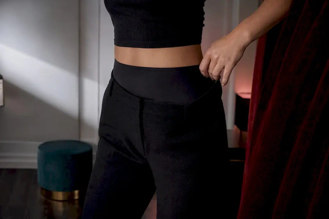 Woman checking high waist smoothing silhouette
