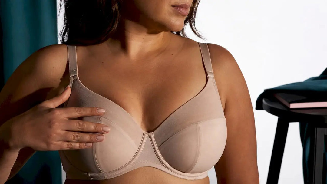 Model wearing minimizer bra in studio
