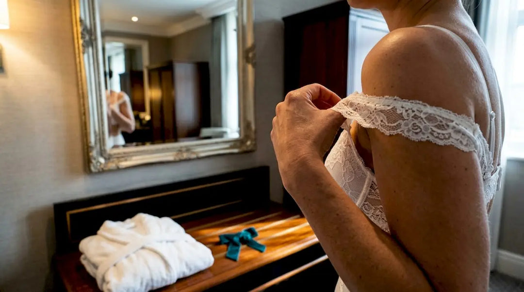 Bride checking bridal lingerie fit